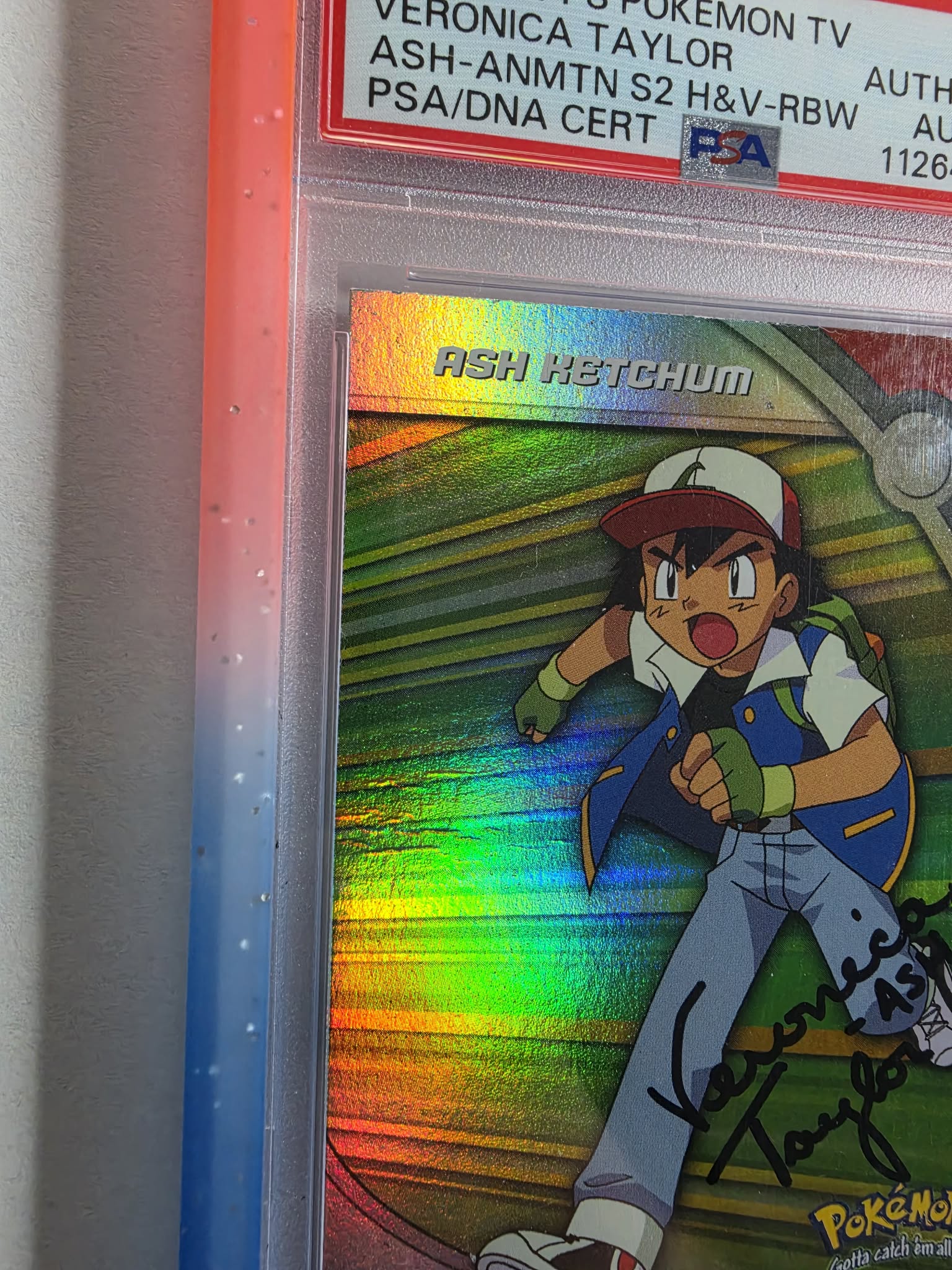 Ash Ketchum Topps Rainbow Foil Signed by Veronica Taylor PSA Auto 10